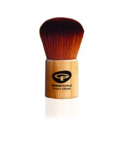 A product photo of a kabuki makeup brush with a short, light wood handle and a dense, rounded head of dark brown bristles. The handle is branded with the Green People logo.