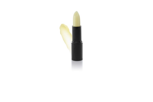 A product photo of an open lip primer in a black lipstick tube. A creamy, light-yellow swatch is visible next to the tube, highlighting the product's smooth texture and colour.